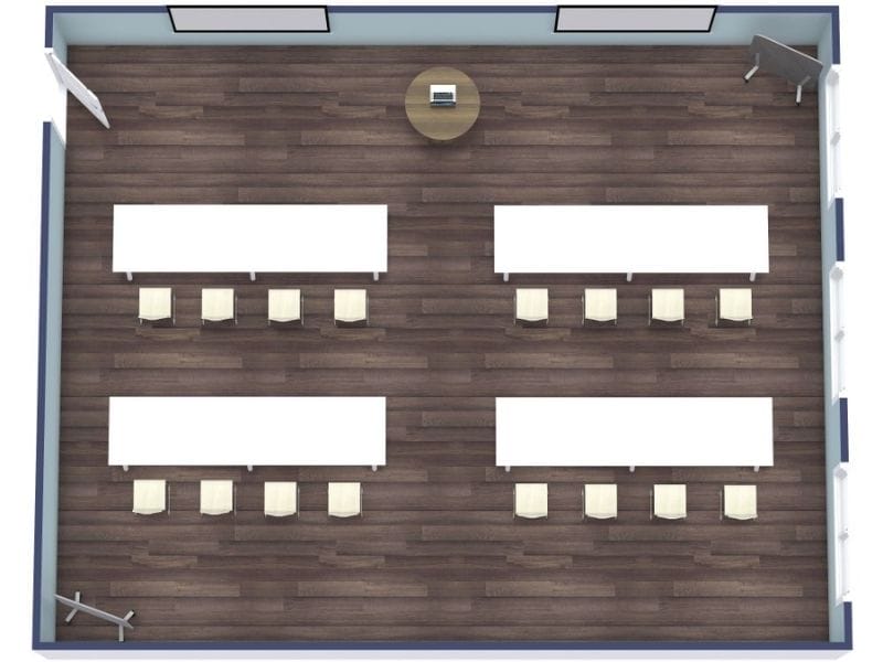 3D floor plan of a rectangular classroom or training room with four long rectangular tables arranged in two rows, each seating four chairs.