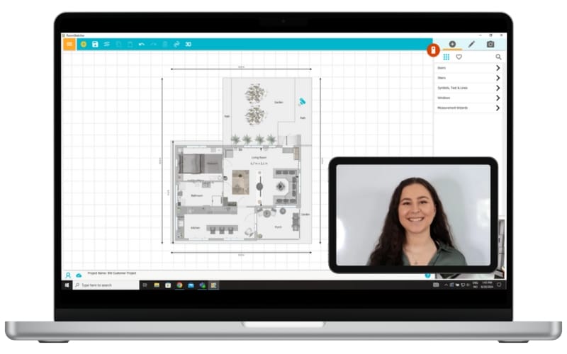 Laptop screen showing a floor plan in a design software interface, with a video call window in the corner featuring a smiling woman with long dark hair.