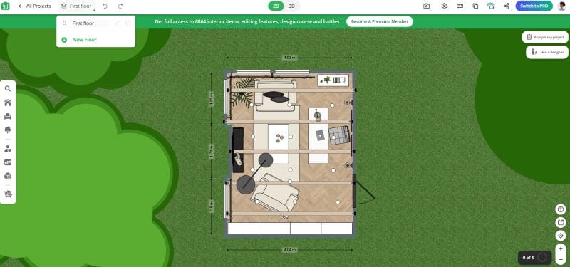 Top-down 2D floor plan created in Planner 5D showing a single-room interior with light wood flooring, a sofa, armchair, coffee tables, TV, and various decor items. Dimensions are marked along the exterior walls, and the room is surrounded by green outdoor space with large trees.