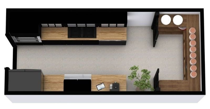 A 3D top-view rendering of a long galley kitchen with wood countertops and black cabinets. One side has the cooktop and sink, and the opposite side includes a refrigerator and small appliances. At the far end, an L-shaped counter creates a compact breakfast nook with stools.