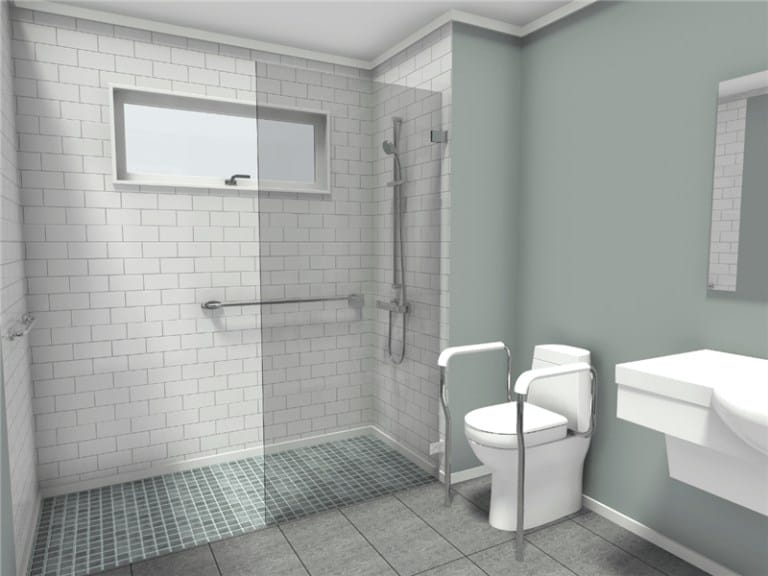 Accessible bathroom with a roll-in shower, wall-mounted grab bar, handheld showerhead, raised toilet with support rails, and wall-mounted sink.